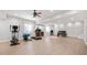 Spacious finished basement with workout equipment and neutral walls at 5202 Logan Ln, Indianapolis, IN 46250