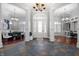 Elegant foyer featuring slate floors, a grand entrance, and open living spaces at 5202 Logan Ln, Indianapolis, IN 46250