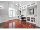 Bright home office with custom built-ins, hardwood floors, and natural light at 5202 Logan Ln, Indianapolis, IN 46250