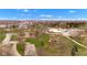 An aerial view of a spacious park featuring a playground, open green areas, trees, and convenient parking at 524 N Meridian St, Lebanon, IN 46052