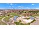 The aerial view showcases a vibrant waterpark with slides, pools, and manicured green spaces near a baseball diamond at 524 N Meridian St, Lebanon, IN 46052