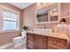 Bathroom featuring granite countertop, vessel sink, and decorative mirror and fixtures at 524 N Meridian St, Lebanon, IN 46052