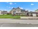 Attractive home with a detached garage, a cozy front porch, and a lush, green lawn at 524 N Meridian St, Lebanon, IN 46052