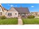 Charming home with manicured lawn, stone accents, and a cozy front porch, creating curb appeal at 524 N Meridian St, Lebanon, IN 46052