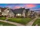 Charming home featuring stone accents, a manicured lawn, and beautiful landscaping at 524 N Meridian St, Lebanon, IN 46052