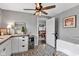 Bright laundry area boasting unique tile flooring, modern cabinets, stainless steel appliances, and natural light at 524 N Meridian St, Lebanon, IN 46052