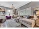 Bright living room with large windows, built-in shelves, and comfortable seating at 524 N Meridian St, Lebanon, IN 46052