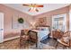 Cozy bedroom featuring a queen bed, wood floors, accent furniture, and a bright window with natural light at 524 N Meridian St, Lebanon, IN 46052