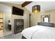 Cozy bedroom with a comfortable bed, dresser, and ensuite bathroom entrance at 5344 Tincher Rd, Indianapolis, IN 46221
