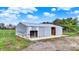 Large metal barn with sliding doors, suitable for storage or agricultural purposes at 5442 W 400 N, Fairland, IN 46126