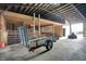Spacious barn interior with exposed wood beams, concrete floor and exterior access at 5442 W 400 N, Fairland, IN 46126