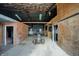 A look inside a spacious barn featuring concrete flooring and unfinished wooden interior walls at 5442 W 400 N, Fairland, IN 46126