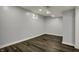 Cozy basement bedroom with a small window and modern flooring at 5442 W 400 N, Fairland, IN 46126