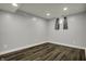 Cozy basement bedroom with a small window and modern flooring at 5442 W 400 N, Fairland, IN 46126