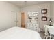 Bright bedroom featuring a white dresser, desk, and coordinated decor at 5694 Walkabout Way, Brownsburg, IN 46112