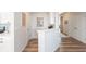 Hallway with white wainscotting and doors leading to other rooms at 5694 Walkabout Way, Brownsburg, IN 46112