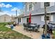 Outdoor patio area, perfect for entertaining, with a grill, table, chairs, and string lights at 594 N Shore Blvd, Franklin, IN 46131