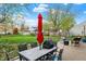 Outdoor patio features a dining set, grill, and lounge seating, perfect for relaxing and entertaining at 594 N Shore Blvd, Franklin, IN 46131