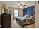 Comfortable bedroom with ceiling fan and decorative accents at 594 N Shore Blvd, Franklin, IN 46131