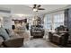 Open-concept living room featuring kitchen and dining area at 594 N Shore Blvd, Franklin, IN 46131