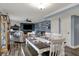 Cozy living room featuring dining area and fireplace at 594 N Shore Blvd, Franklin, IN 46131