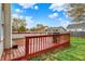Large backyard features a spacious deck and grill, perfect for outdoor entertaining at 6064 Brandermill Rdg, Columbus, IN 47203