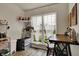 Bright breakfast nook with a charming setup, ideal for enjoying morning coffee or quiet moments with a view of the outdoors at 6064 Brandermill Rdg, Columbus, IN 47203