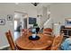 Cozy dining area with a round wooden table, perfect for Gathering meals and gatherings at 6064 Brandermill Rdg, Columbus, IN 47203
