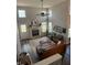 Spacious living room featuring high ceilings, a fireplace, and modern decor at 6064 Brandermill Rdg, Columbus, IN 47203