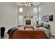 Spacious living room with a cozy fireplace, comfortable seating, and stylish decor at 6064 Brandermill Rdg, Columbus, IN 47203