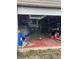 Garage with an open door featuring storage and tools at 6426 Maple Lawn Rd, Indianapolis, IN 46241