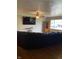 Inviting living room featuring hardwood floors, and a wall-mounted TV at 6426 Maple Lawn Rd, Indianapolis, IN 46241