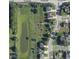 Aerial view of neighborhood showing proximity to community playground and pond at 6518 Sonesta Dr, Indianapolis, IN 46217