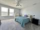 Charming bedroom featuring two bright windows, plush carpeting, and ample space, creating a cozy atmosphere at 6518 Sonesta Dr, Indianapolis, IN 46217