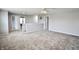 Spacious bonus room featuring neutral paint, plush carpeting, and ample natural light, perfect for versatile living at 6518 Sonesta Dr, Indianapolis, IN 46217