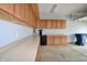 Well-organized garage featuring ample cabinet space and durable flooring, perfect for storage and projects at 6518 Sonesta Dr, Indianapolis, IN 46217