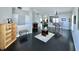 Open-concept living area featuring hardwood floors, neutral walls, and stylish furniture, perfect for modern living at 6518 Sonesta Dr, Indianapolis, IN 46217