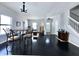 Bright, open living space with hardwood floors, a staircase, and a dining area, creating a welcoming atmosphere at 6518 Sonesta Dr, Indianapolis, IN 46217