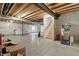 Spacious unfinished basement offering potential for customization and storage at 7391 Blanford Dr, Plainfield, IN 46168