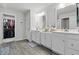 Bathroom with double vanity sinks and a walk-in closet provides ample space and storage at 7391 Blanford Dr, Plainfield, IN 46168