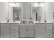 Bright bathroom with dual sinks and large mirrors, offering a modern and functional space at 7391 Blanford Dr, Plainfield, IN 46168