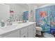 bathroom featuring double vanity and an Ariel-themed shower curtain at 7391 Blanford Dr, Plainfield, IN 46168