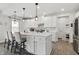 Bright and airy kitchen with a large island, modern appliances, and sleek countertops at 7391 Blanford Dr, Plainfield, IN 46168