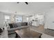 Open-concept living room seamlessly connecting to the dining area and kitchen at 7391 Blanford Dr, Plainfield, IN 46168