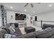 Cozy living room with plush sectional sofa, TV, and large window at 7391 Blanford Dr, Plainfield, IN 46168