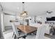 Open-concept living space with dining area and kitchen, perfect for entertaining and Gathering gatherings at 7391 Blanford Dr, Plainfield, IN 46168