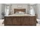 Main bedroom features a wooden bedframe, accent lighting, and a 'Grateful Heart' decor sign at 7391 Blanford Dr, Plainfield, IN 46168