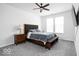Bedroom with a king bed, gray carpet, and a ceiling fan at 745 Stone Trace Ct, Avon, IN 46123