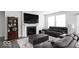 Cozy living room featuring a fireplace, large TV, and comfortable seating at 745 Stone Trace Ct, Avon, IN 46123