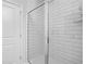 Shower with glass door and white subway tile at 745 Stone Trace Ct, Avon, IN 46123